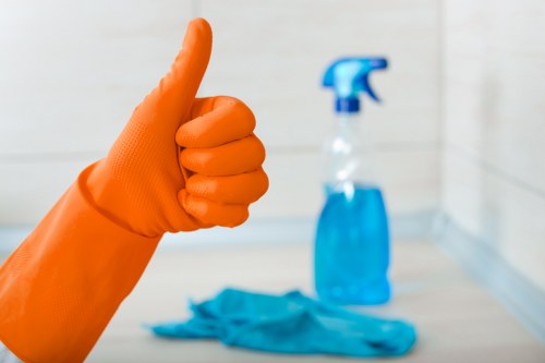 Window cleaner preparing a Tockwell property for a spotless finish